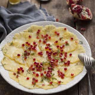 pineapple carpaccio with a ginger, mint, lime and chilli dressing