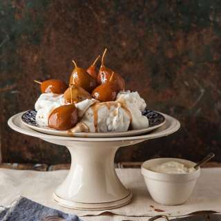 Brown sugar pavlova with poached pears