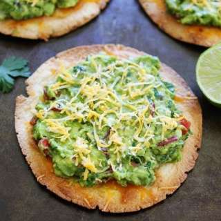 Cheesy Guacamole Tostadas