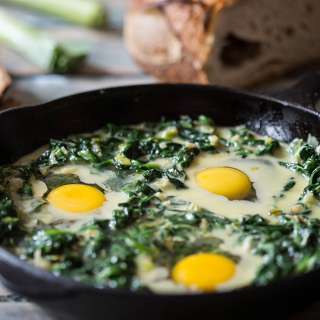 Eggs baked in creamy spinach & leeks
