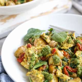 Spinach, Pesto, Sun-Dried Tomato Scramble with Fingerling Potatoes