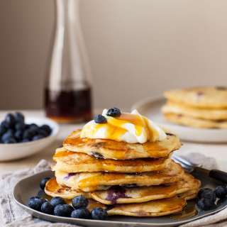 Blueberry pancakes with ricotta and orange