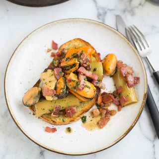 Mussels, leeks and bacon on sourdough toast