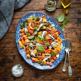Panzanella salad with white anchovies, fennel & capers