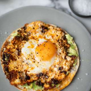 Eggs fried in feta and chilli crisp oil (viral recipe)