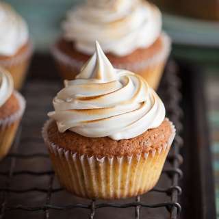 Lemon pistachio cupcakes with a honey meringue frosting