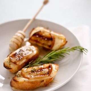 Grilled Pear, Honey, and Brie Crostini