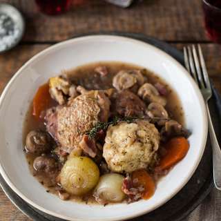 Red wine chicken casserole with herby dumplings