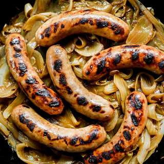 Bratwurst In Beer With Onions