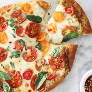 Pesto Pizza with Fresh Tomatoes and Mozzarella