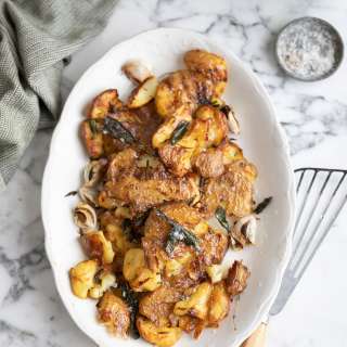 Roast smashed potatoes with brown butter and crispy sage leaves