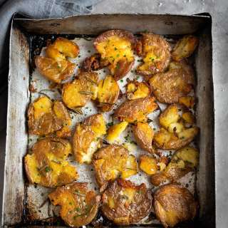 Crispy roasted new potatoes with miso & chive sour cream