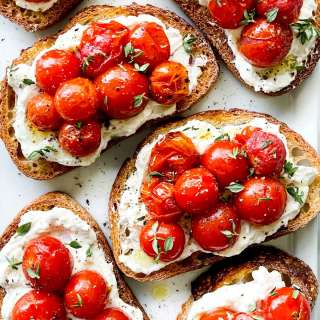 Whipped Ricotta Toast Crostini with Roasted Tomatoes