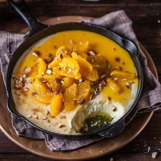 Baked yoghurt with brandied oranges