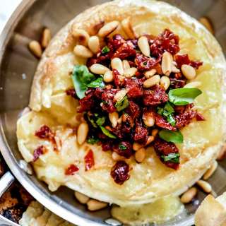 Baked Brie with Sun Dried Tomato and Pine Nuts