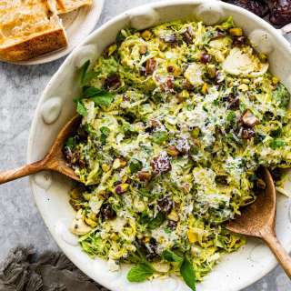 Brussels Sprouts Salad with Dates, Parmesan Cheese, Pistachios & Creamy Lemon Dressing