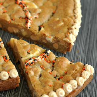 White Chocolate Macadamia Cookie Cake with Peanut Butter Frosting