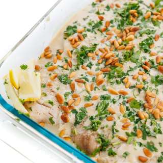 Lebanese Baked Fish with Tahini Sauce and Toasted Pine Nuts
