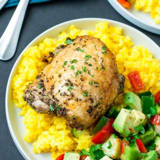 Crispy Baked Chicken Thighs with Garlic Turmeric Rice