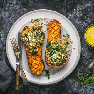 Mustard and Maple-Glazed Butternut Squash stuffed with Farro and Winter Greens